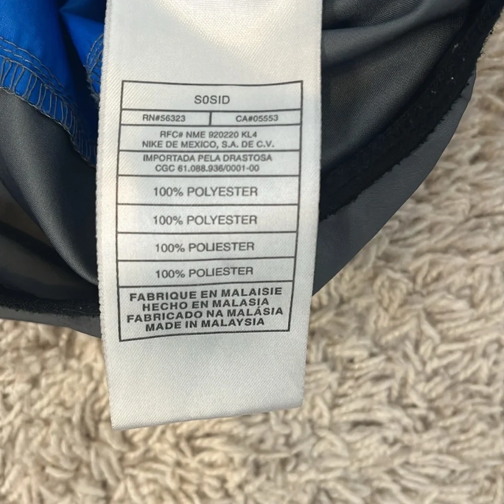 Nike youth L royal blue grey 1/2 zip windbreaker. Loose fit. Great condition